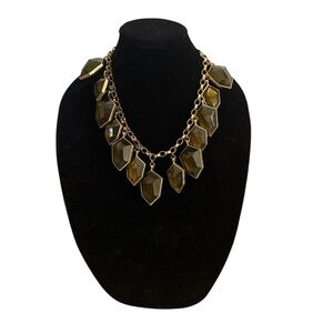 Excellent vintage crystal necklace. Dark green color with gold.